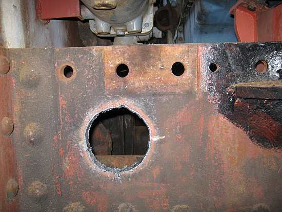 Hole for bottom coolant line