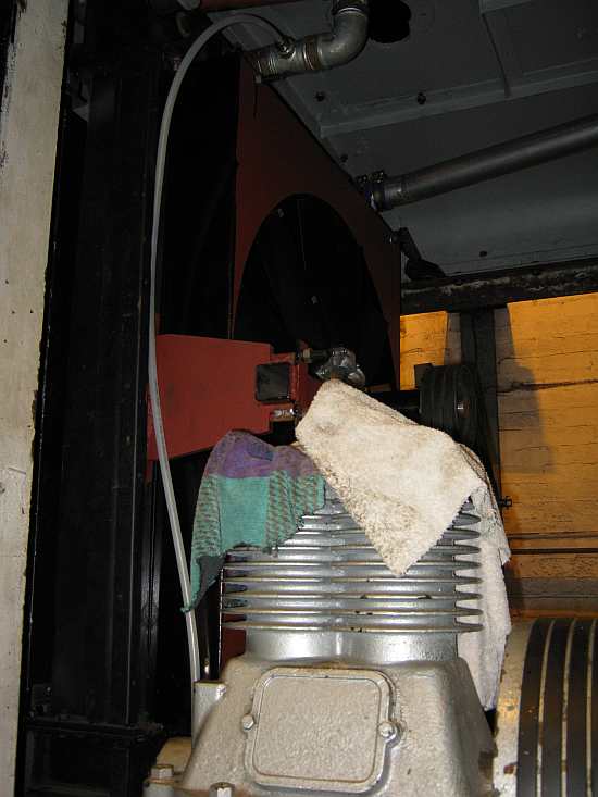 Filling connection at top, plastic pipe is sight guage