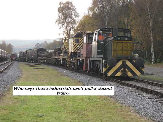 Industrial locos pulling heavy train