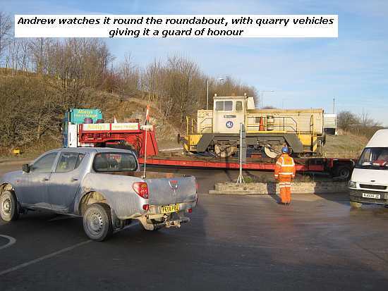 Truck, trailer & Cheedale exit the quarry as Andrew watches on