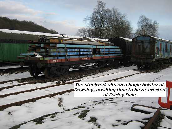 Steelwork sits on bogie wagon at Rowsley