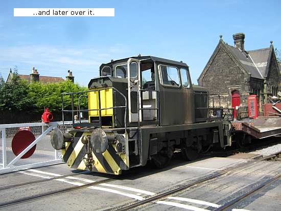 Charlie & works train thru the crossing at Darley
