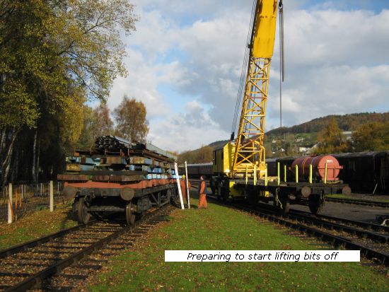 Rail crane preparing to lift