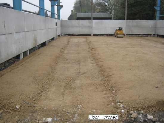 Shed construction - stone base laid for floor