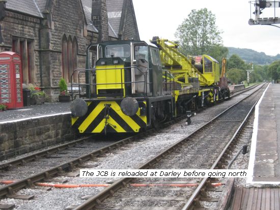 Charlie hauled train with crane & JCB loaded