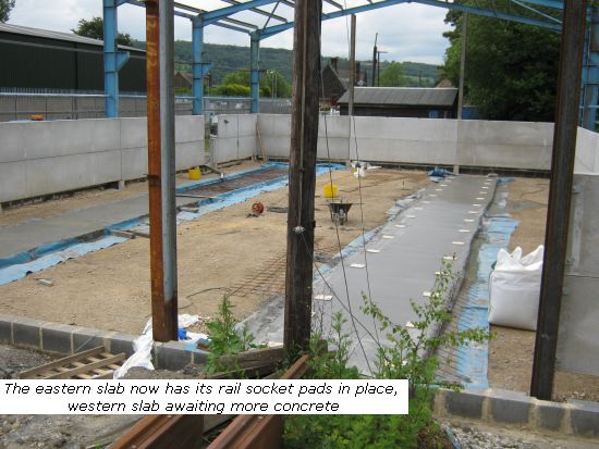 New shed, western slab awaiting more concrete, eastern slab has rail fixings in place