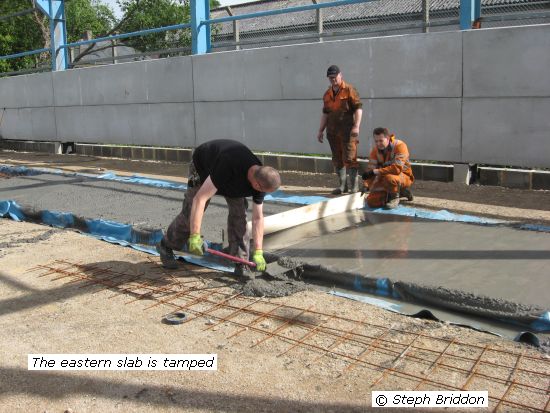Eastern concrete slab is tamped