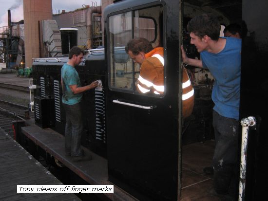 D2128 - Toby cleans the finger marks off the shiney new paint