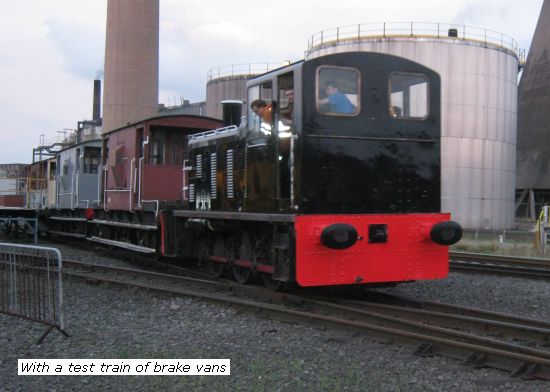 D2128 sets off with a test train of Brake vans
