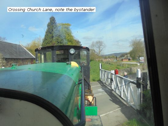 Convoy crossing Church Lane, with interested "bystander"