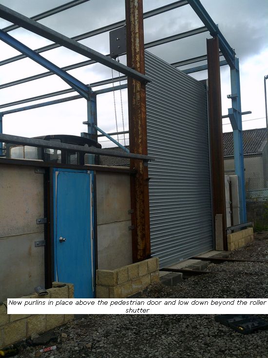 Shed purlins in place above the pedestrian door