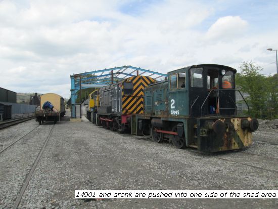 14901 and Gronk are pushed into one side of shed