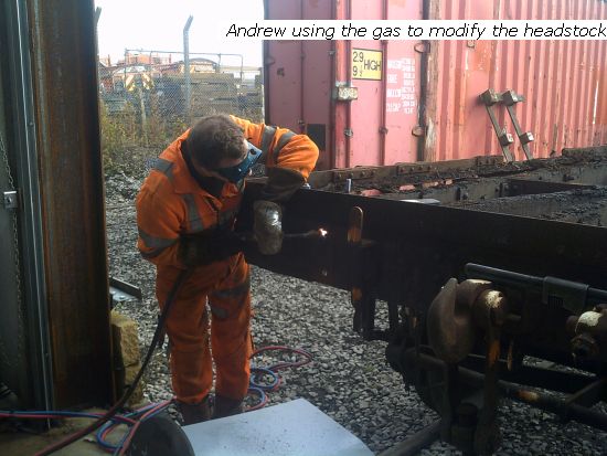 Andrew using gas to modify one of the flats headstock