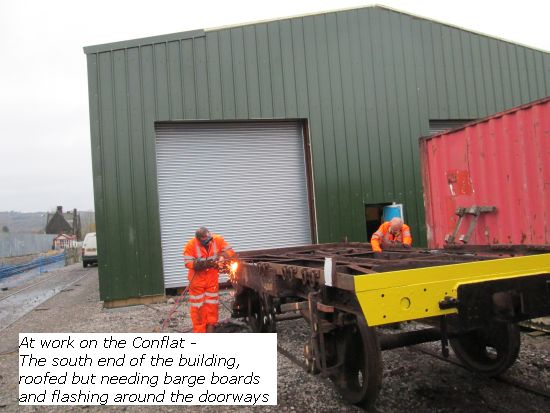 Working on one of the Conflats outside the front of the shed