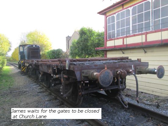 James towing the flat wagons waiting for gates to be closed at Church Lane
