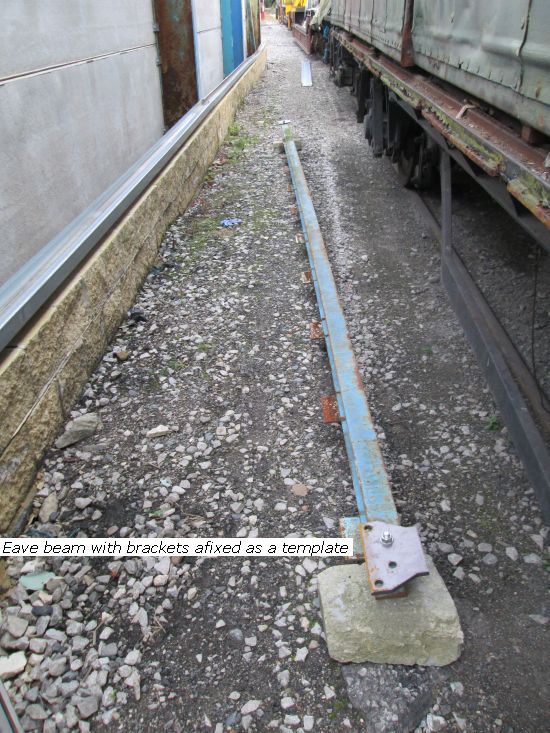 Eave beam, with fixed brackets as a template