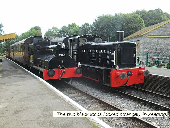 Both in black livery, Joyce, Sentinel 200hp steamer side by side with "D2128" at Midsomer Norton