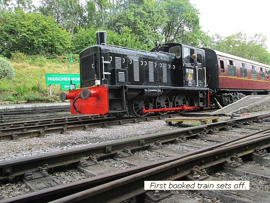 First passenger train departs Midsomer Norton, hauled by "D2128"