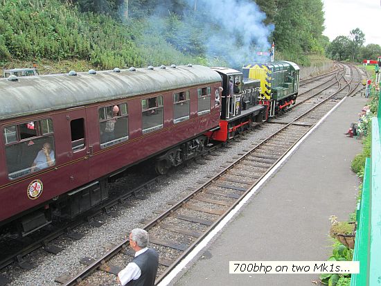 D2128 & EE D1120 depart Midsomer Norton with 2 carriage train