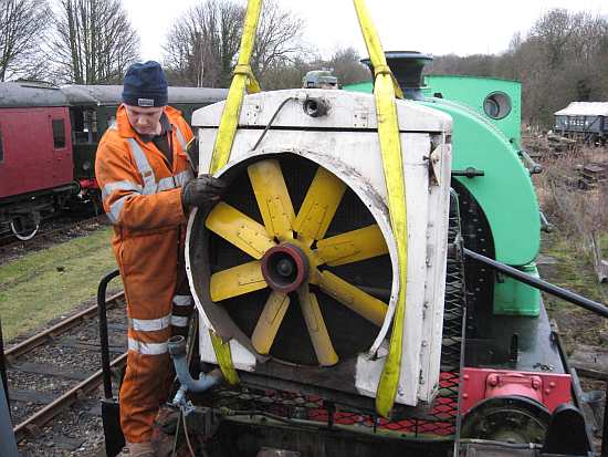 Andrew guides the rad assembly out of the chassis of 14901