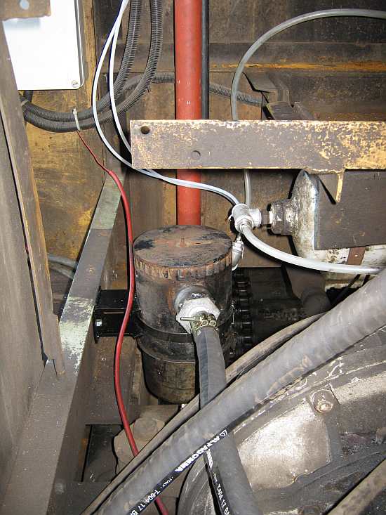 Propshaft immediate right, vac res up & right, fluid coupling in forground