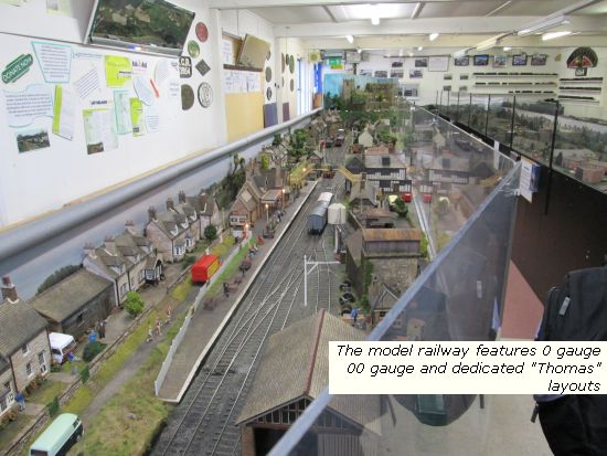 Extensive model rail layouts in O & OO gauges including a "Thomas" layout